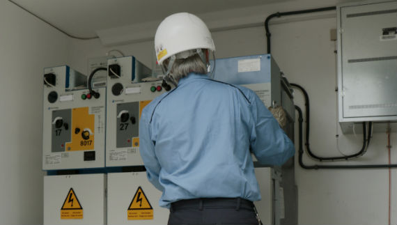 Operator performing work inside a transformer station